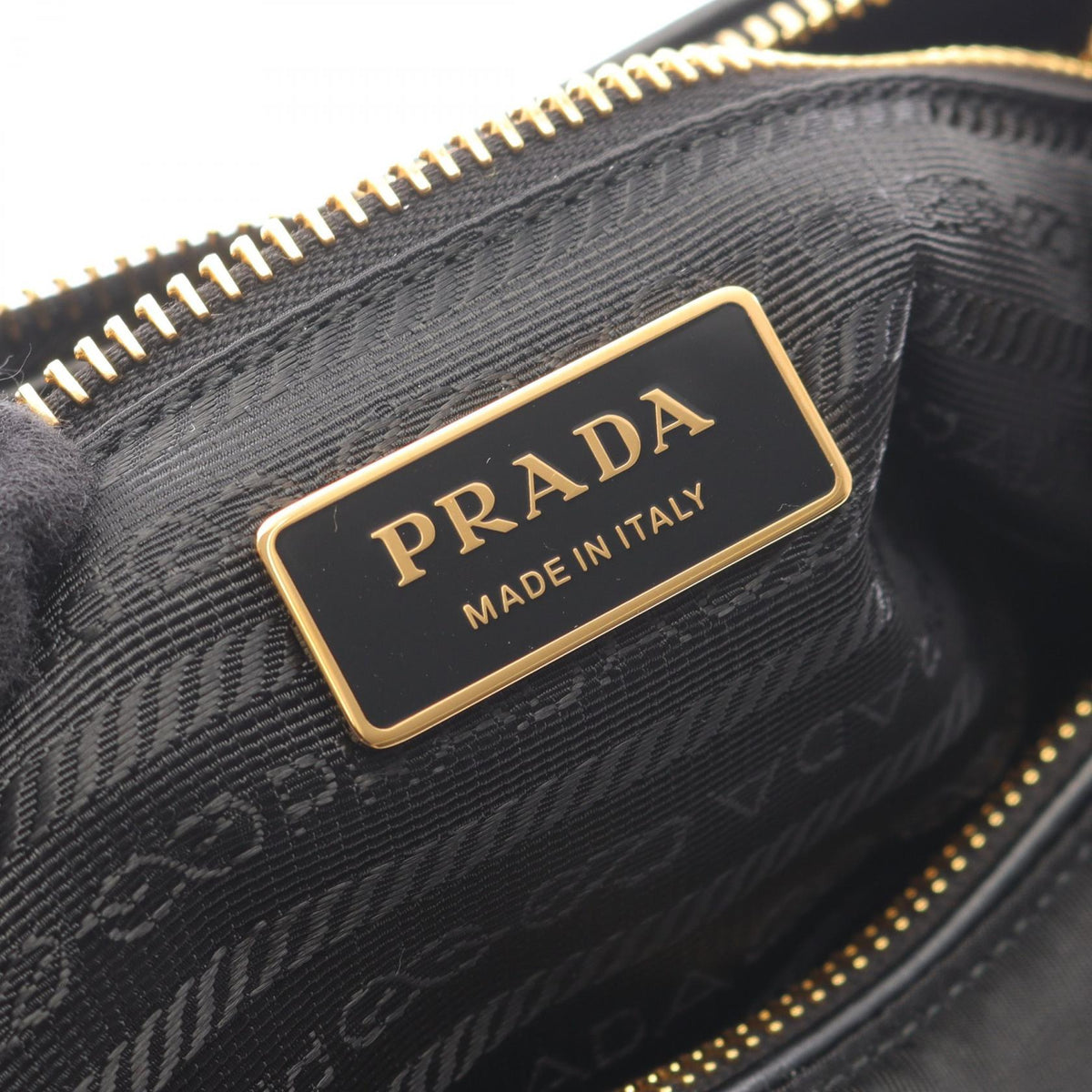 Prada Tessuto · Nylon & Leather