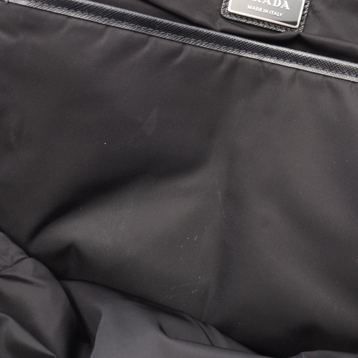 PRADA Re-Nylon · Saffiano Leather Rucksack