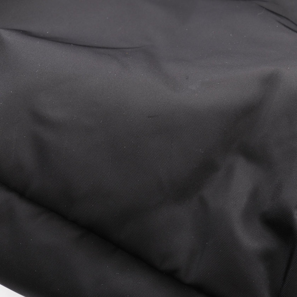 PRADA Re-Nylon · Saffiano Leather Rucksack