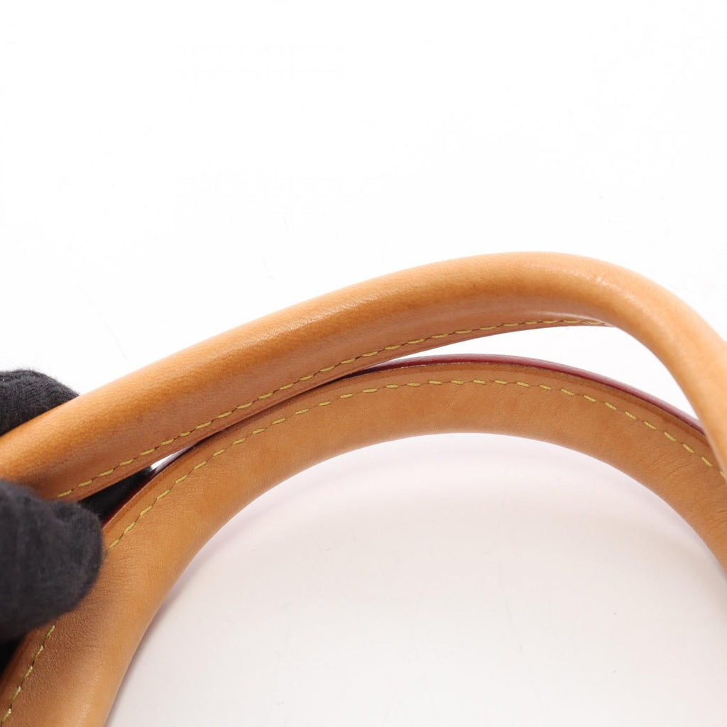 LOUIS VUITTON Rivoli MM · Monogram