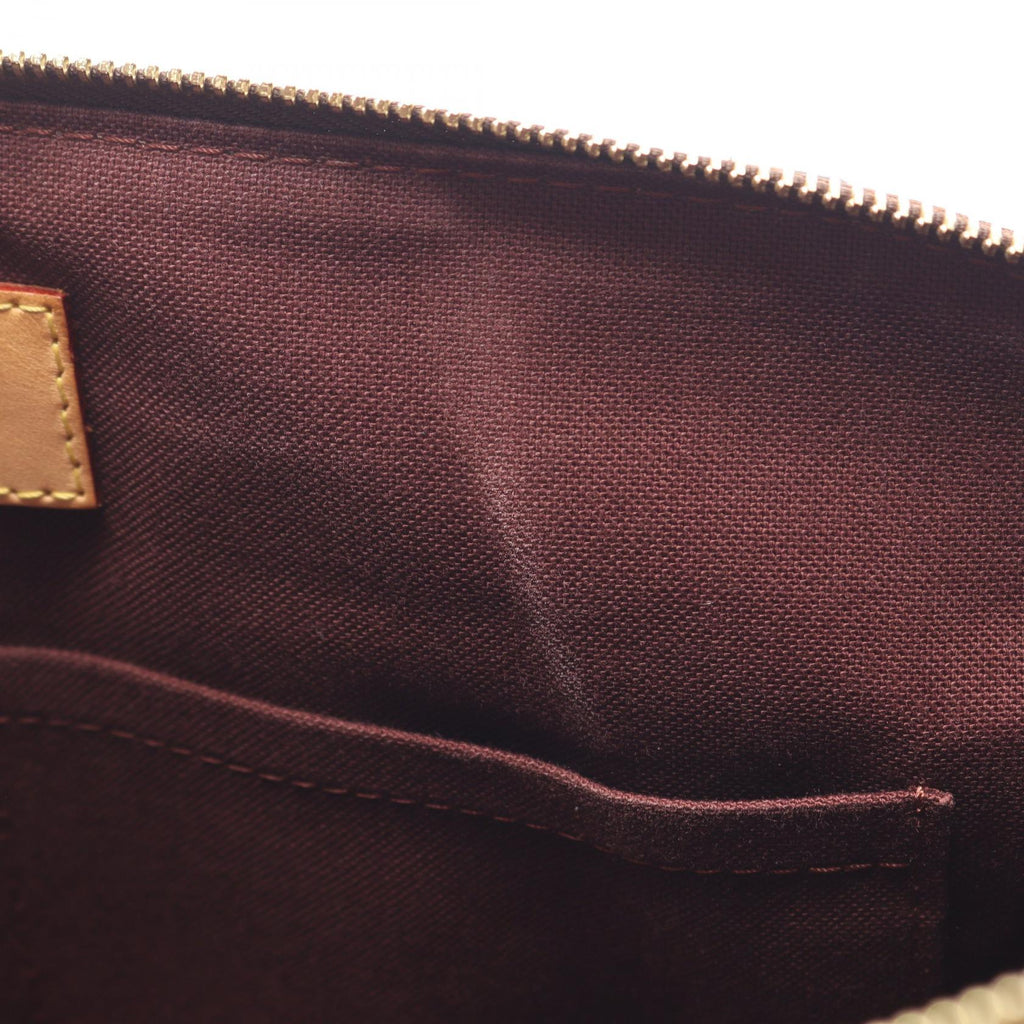 LOUIS VUITTON Rivoli MM · Monogram