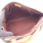 LOUIS VUITTON Rivoli MM · Monogram