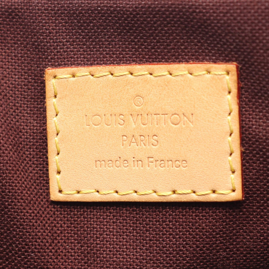 LOUIS VUITTON Rivoli MM · Monogram