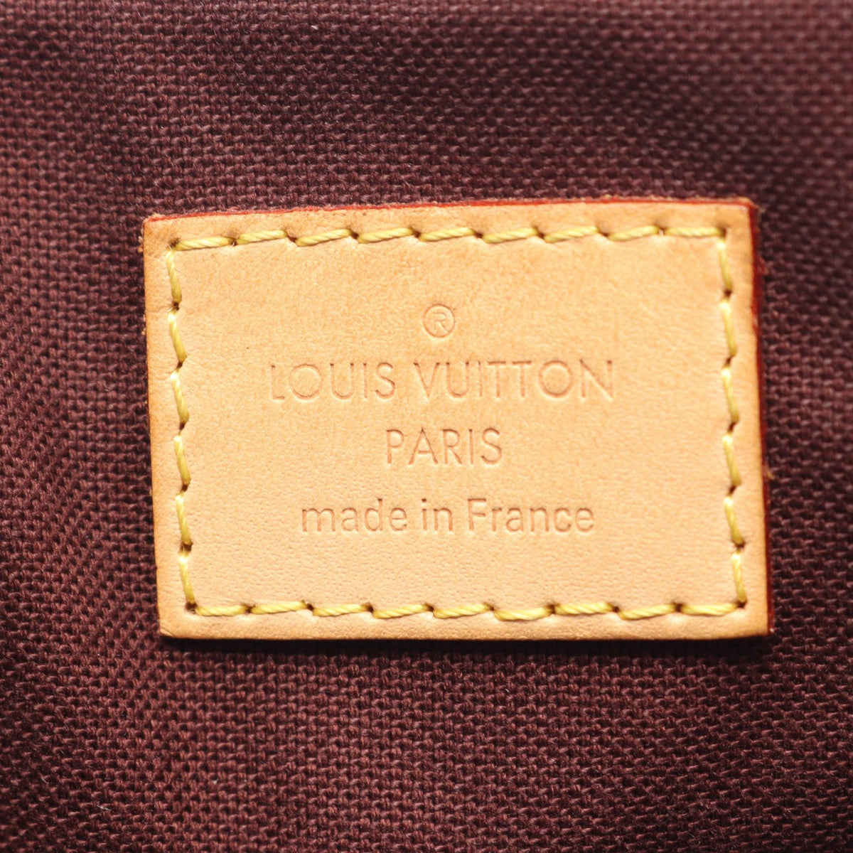 LOUIS VUITTON Rivoli MM · Monogram