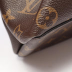 LOUIS VUITTON Rivoli MM · Monogram