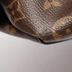 LOUIS VUITTON Rivoli MM · Monogram