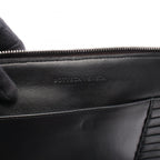 Bottega Veneta Perforated Clutch · Leather
