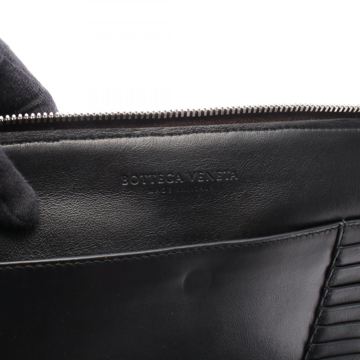 Bottega Veneta Perforated Clutch · Leather