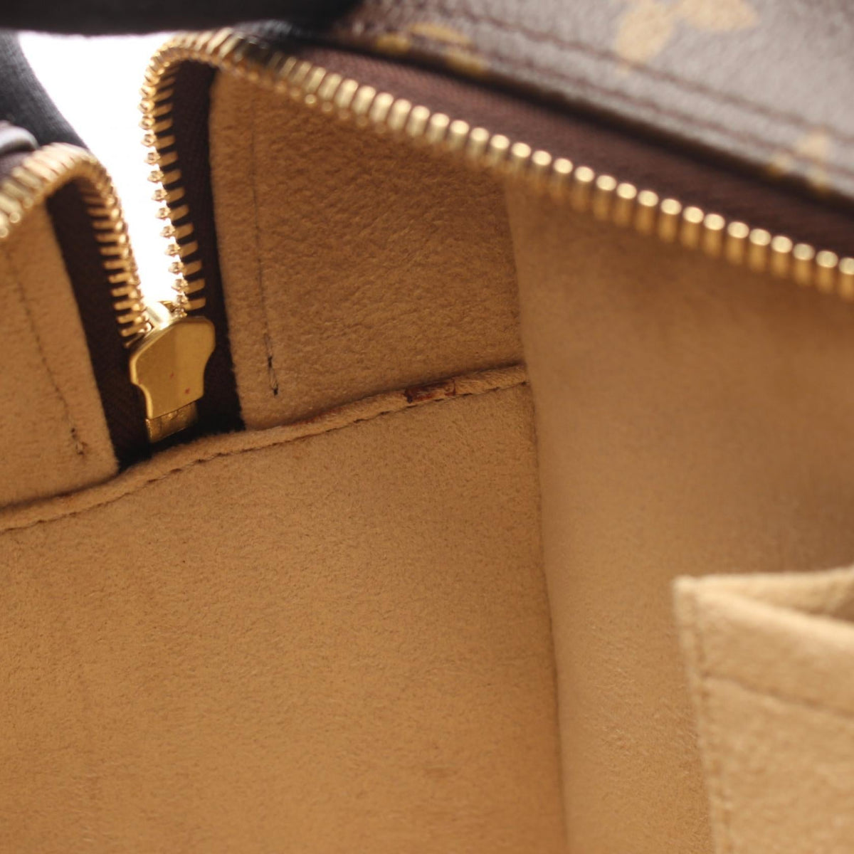 Louis Vuitton Cite GM · Monogram