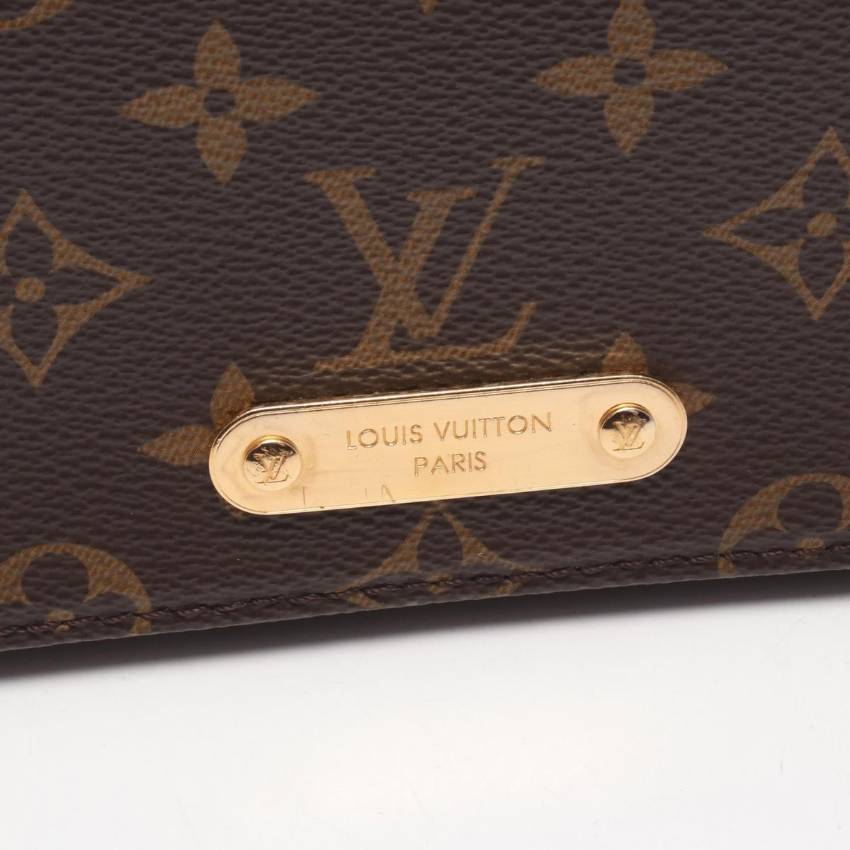 Louis Vuitton Lily · Monogram