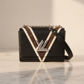Louis Vuitton Twist MM · Epi Monogram