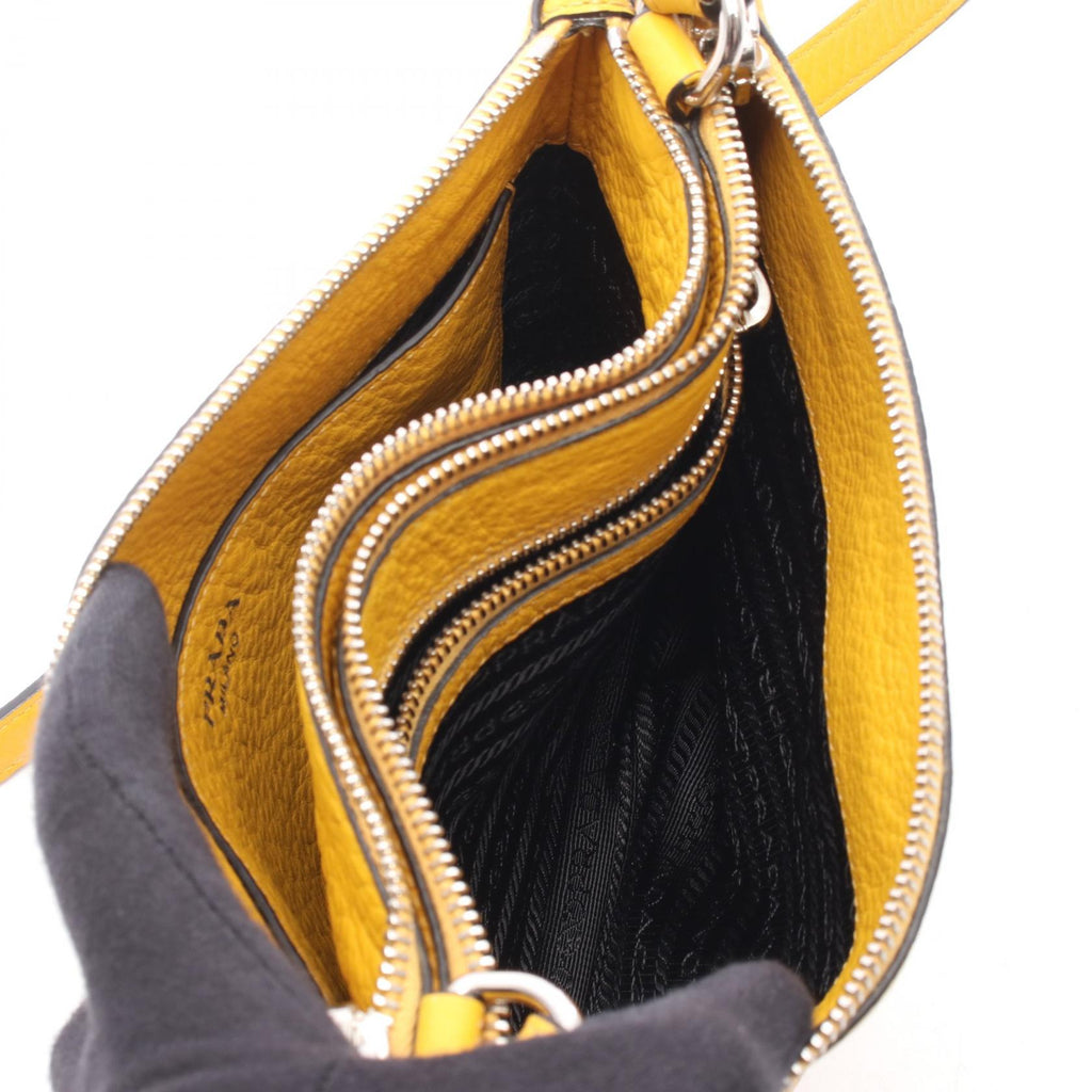 Prada Metal Logo Shoulder Bag · Leather