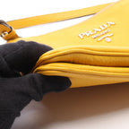 Prada Metal Logo Shoulder Bag · Leather
