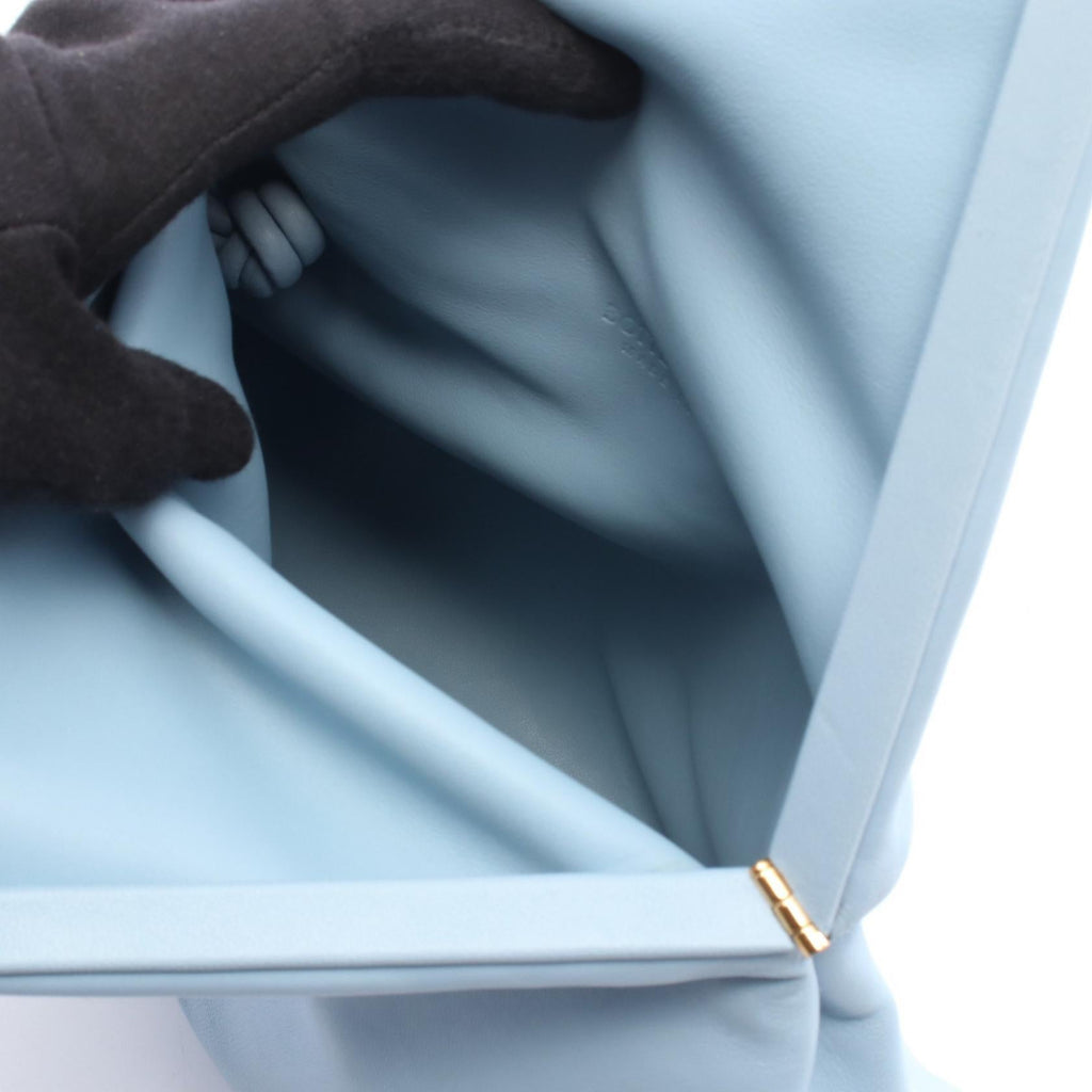 BOTTEGA VENETA Triangle Flap Clutch · Leather