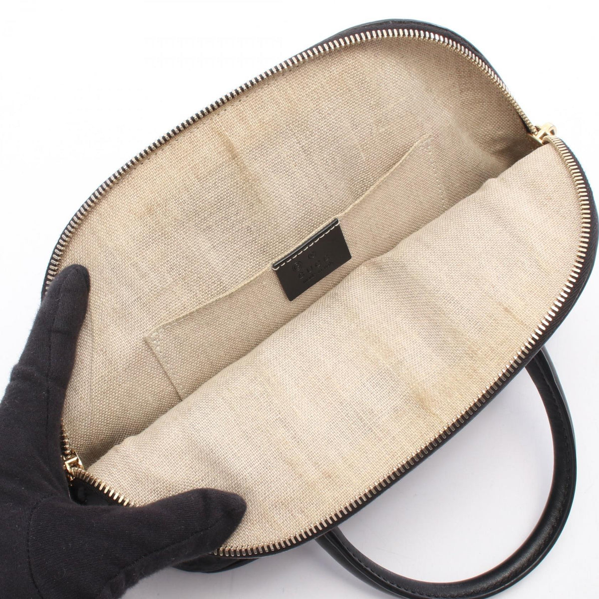 Gucci Micro Guccissima · Leather Handbag