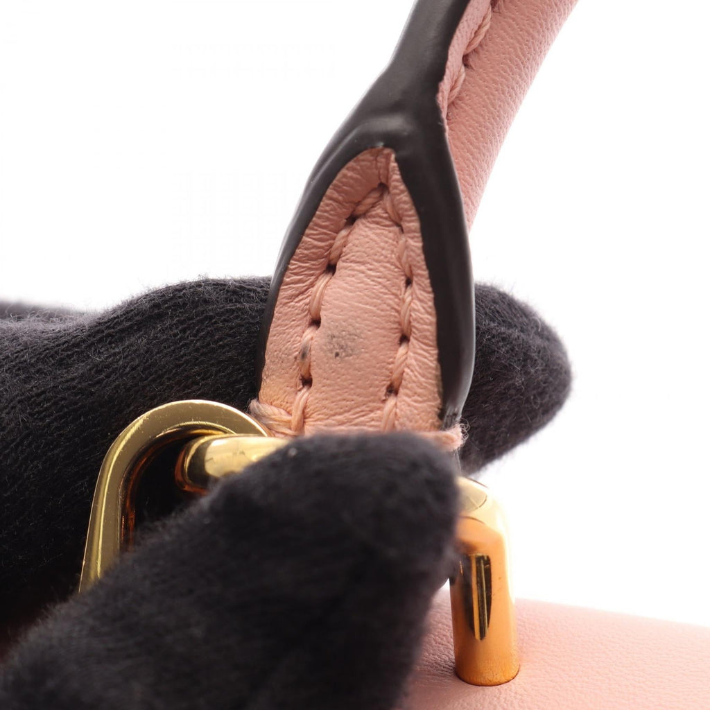Louis Vuitton Rocky BB · Monogram Rose Poodle