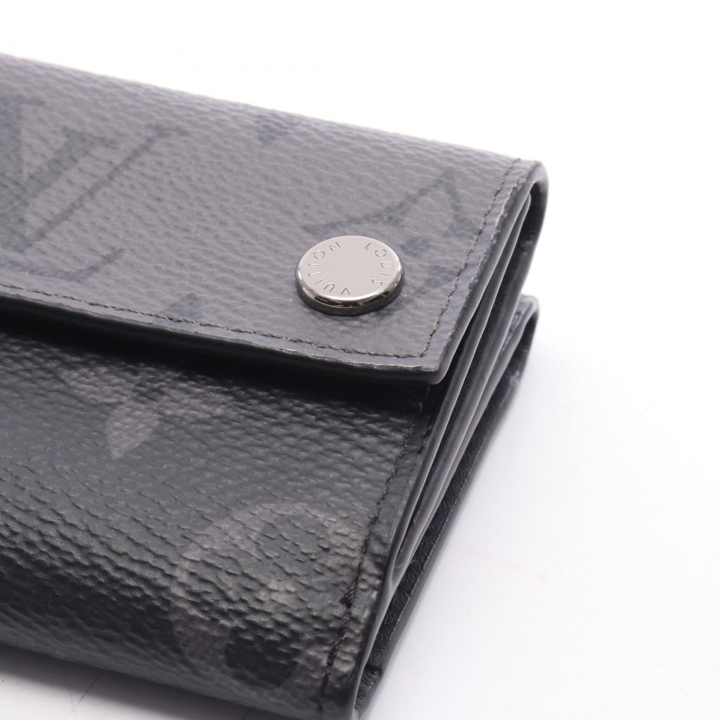 Louis Vuitton Discovery · Monogram Eclipse