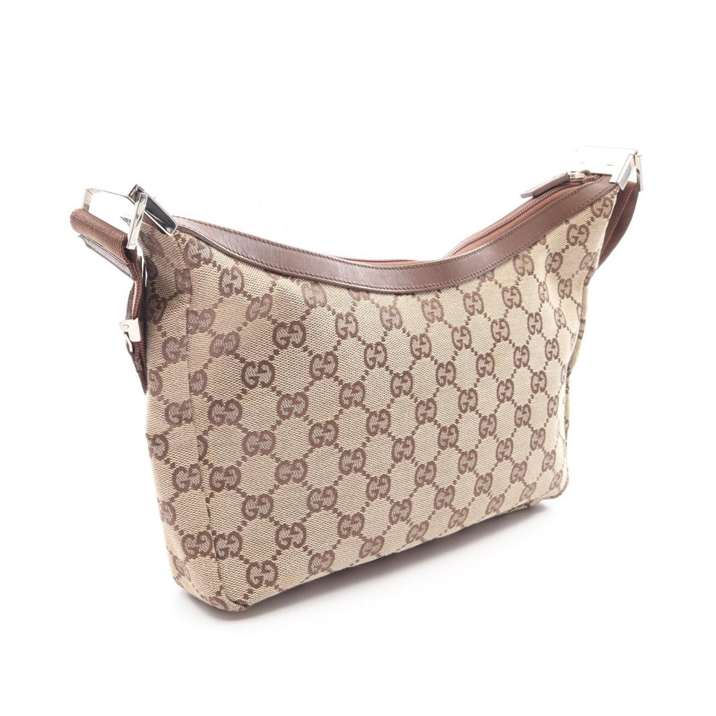 Gucci GG Canvas · Canvas & Leather