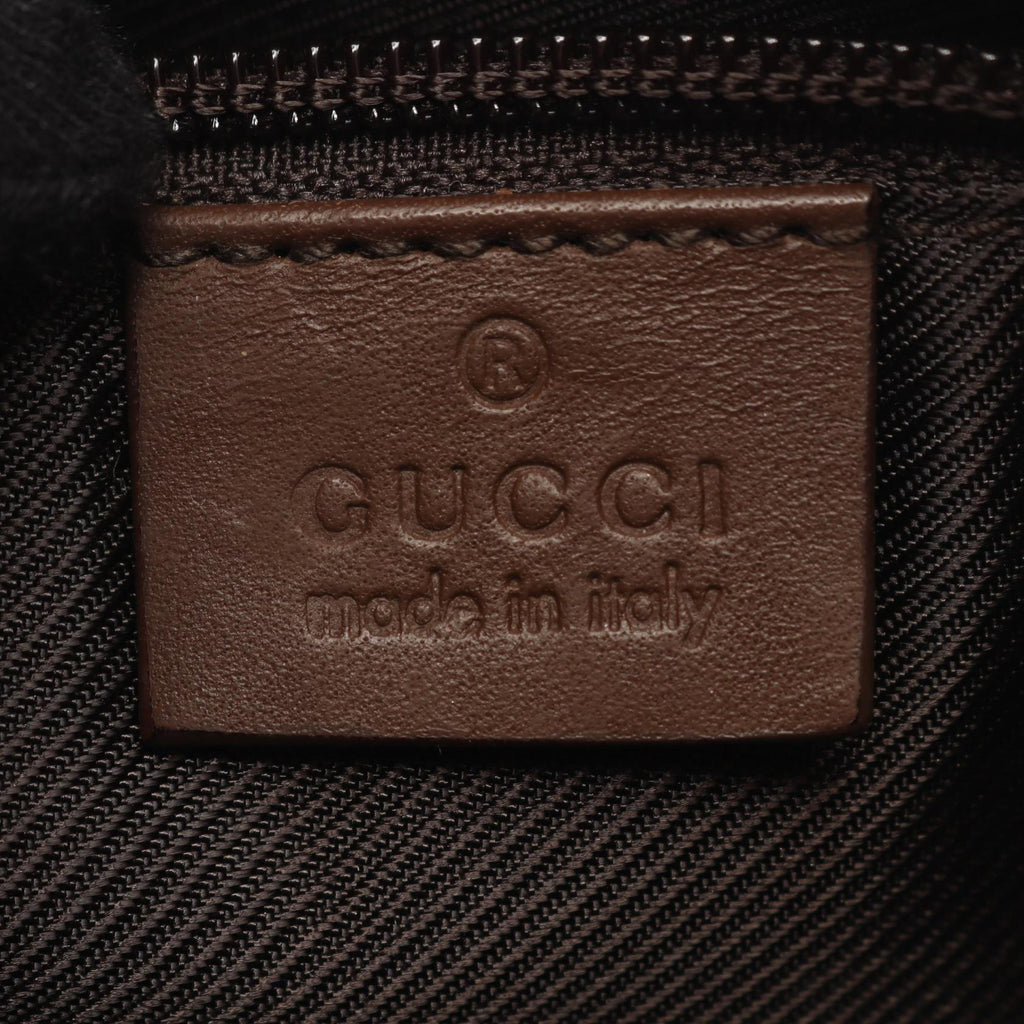 Gucci GG Canvas · Canvas & Leather