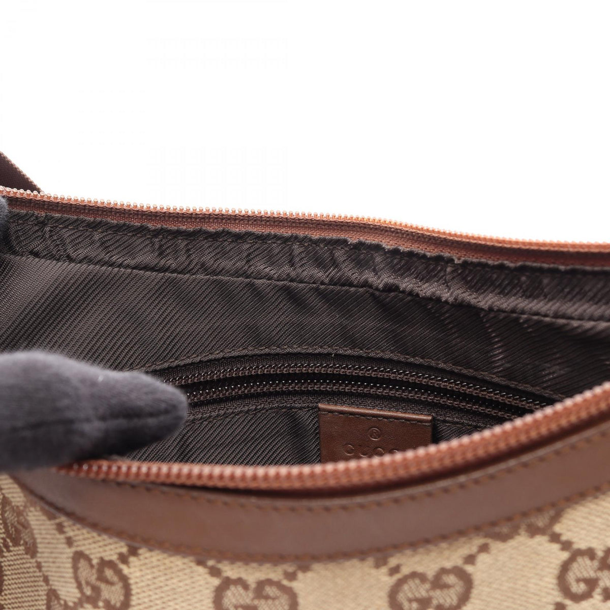 Gucci GG Canvas · Canvas & Leather