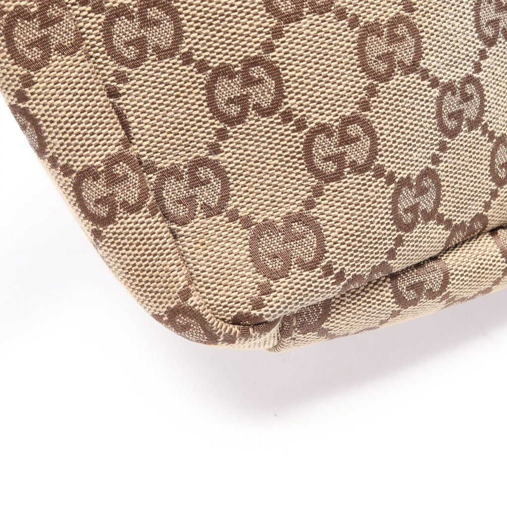 Gucci GG Canvas · Canvas & Leather
