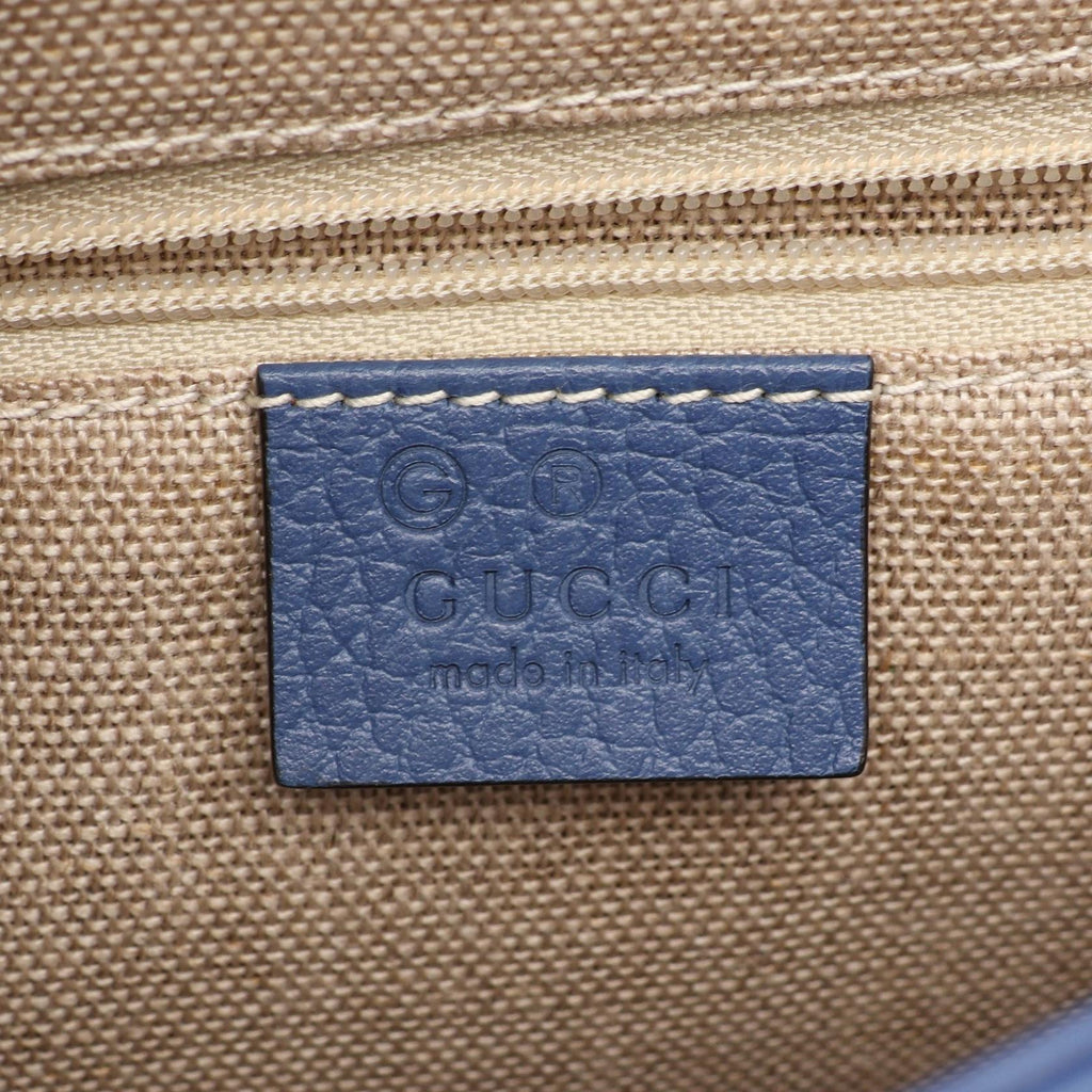 Gucci Interlocking G · Leather