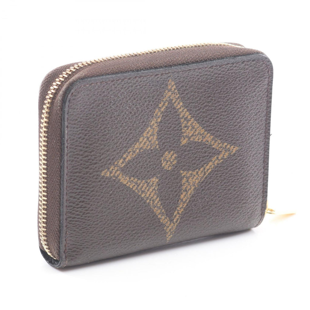 Louis Vuitton Zippy · Monogram Giant Reverse