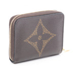 Louis Vuitton Zippy · Monogram Giant Reverse