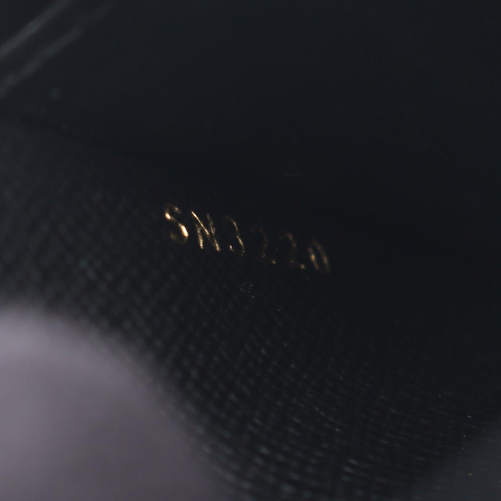 Louis Vuitton Zippy · Monogram Giant Reverse