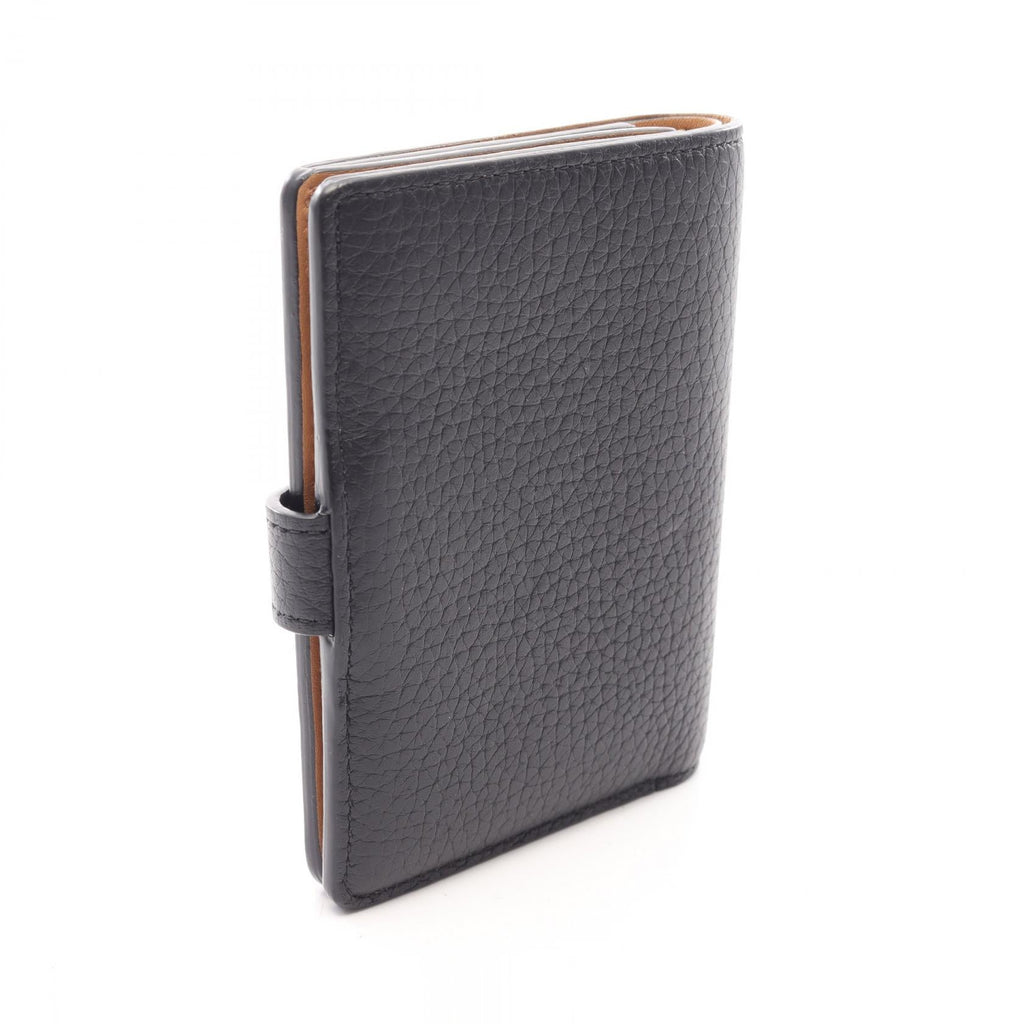 Louis Vuitton LV Vertical · Taurillon
