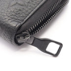 Louis Vuitton Zippy · Monogram Taurillon