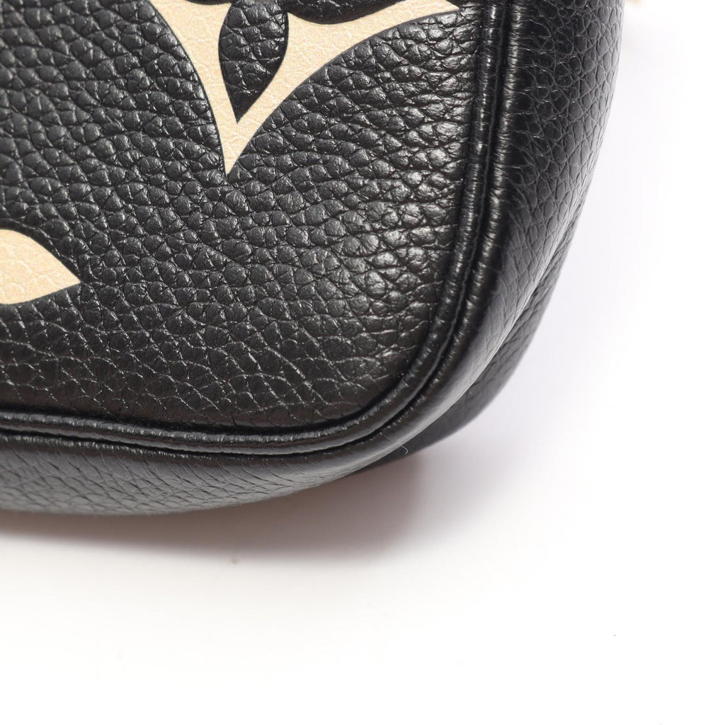 Louis Vuitton Mini Pochette · Monogram Empreinte