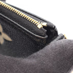 Louis Vuitton Mini Pochette · Monogram Empreinte
