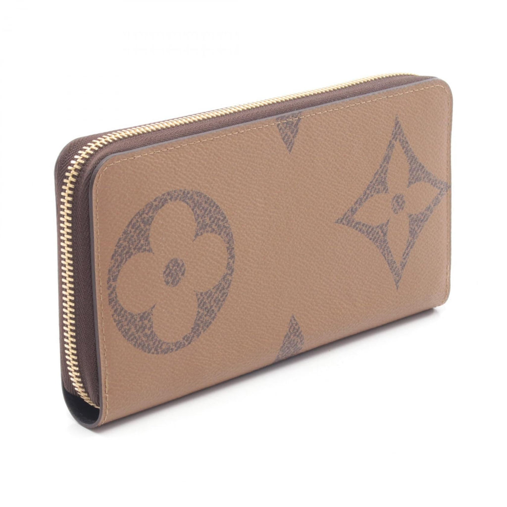 Louis Vuitton Zippy · Monogram Giant Reverse
