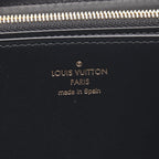 Louis Vuitton Zippy · Monogram Giant Reverse