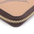 Louis Vuitton Zippy · Monogram Giant Reverse