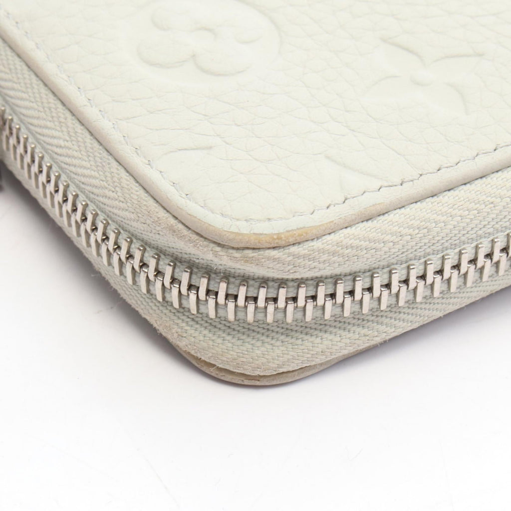 Louis Vuitton Zippy Vertical · Empreinte