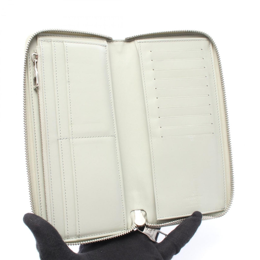 Louis Vuitton Zippy Vertical · Empreinte
