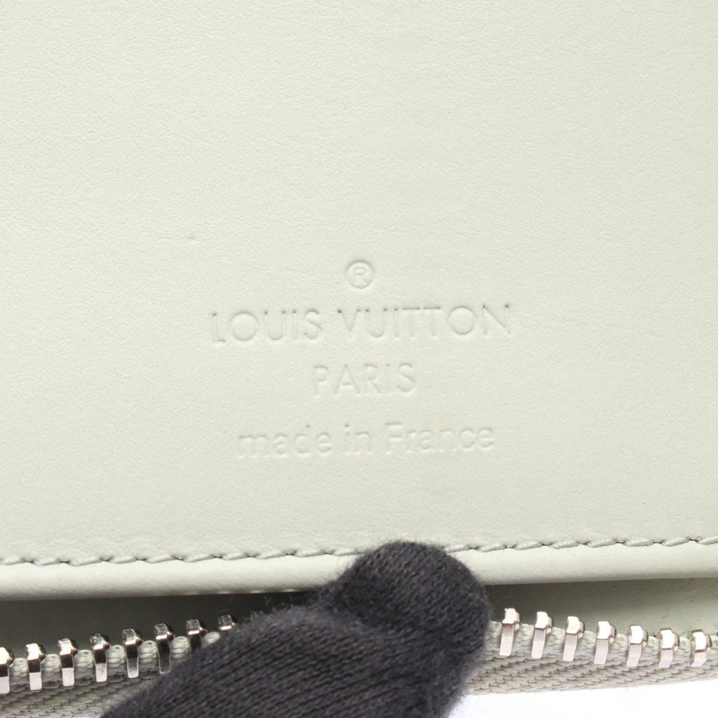 Louis Vuitton Zippy Vertical · Empreinte