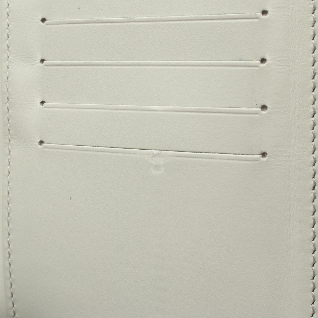 Louis Vuitton Zippy Vertical · Empreinte