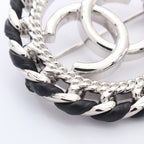 CHANEL CC Circle Brooch · Leather