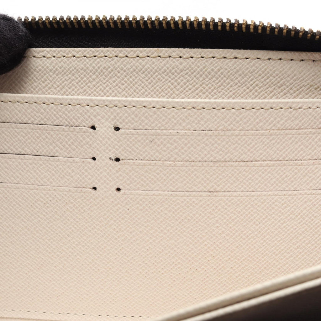 Louis Vuitton Zippy · LV Crafty · Canvas