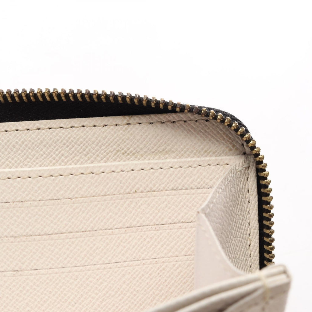 Louis Vuitton Zippy · LV Crafty · Canvas