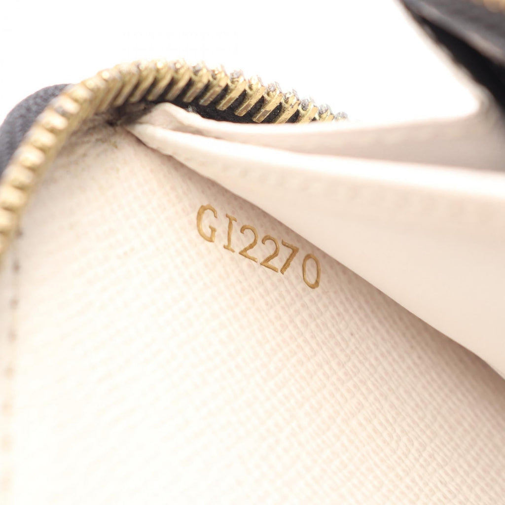 Louis Vuitton Zippy · LV Crafty · Canvas