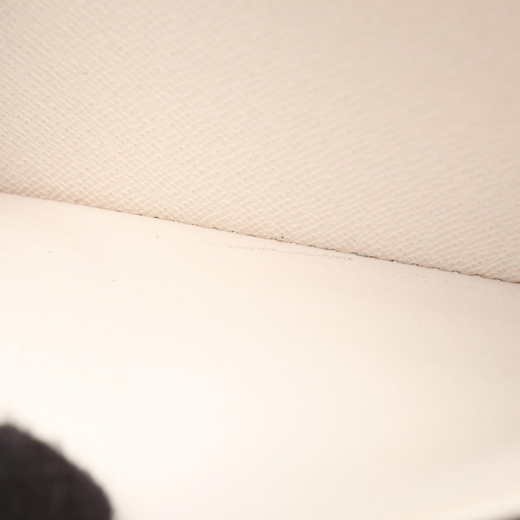Louis Vuitton Zippy · LV Crafty · Canvas