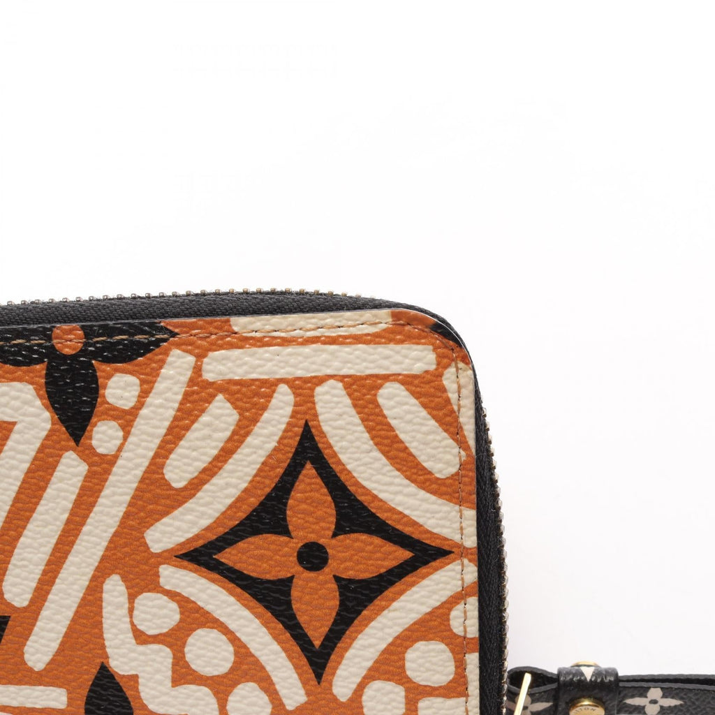 Louis Vuitton Zippy · LV Crafty · Canvas
