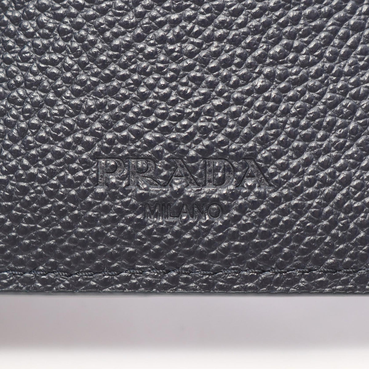 Prada · Micro Grain Leather Bi-Fold Wallet