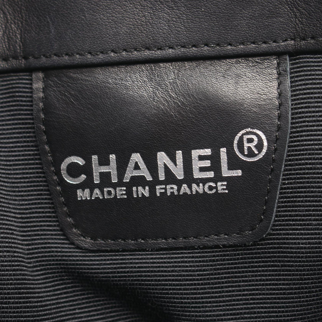 Chanel Embossed Logo · Lambskin