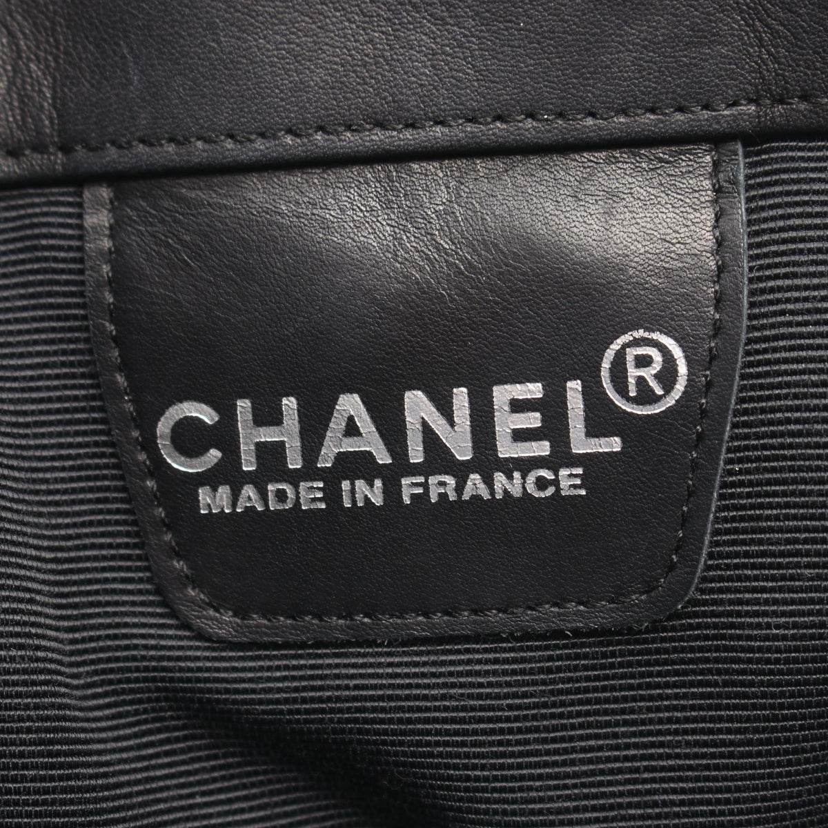 Chanel Embossed Logo · Lambskin