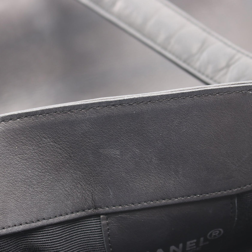 Chanel Embossed Logo · Lambskin